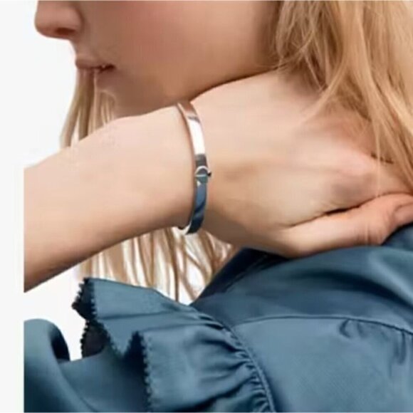 NWT Kate Spade Silver Heritage Spade Logo Metal Button Bangle Bracelet Dust Bag - Picture 4 of 10